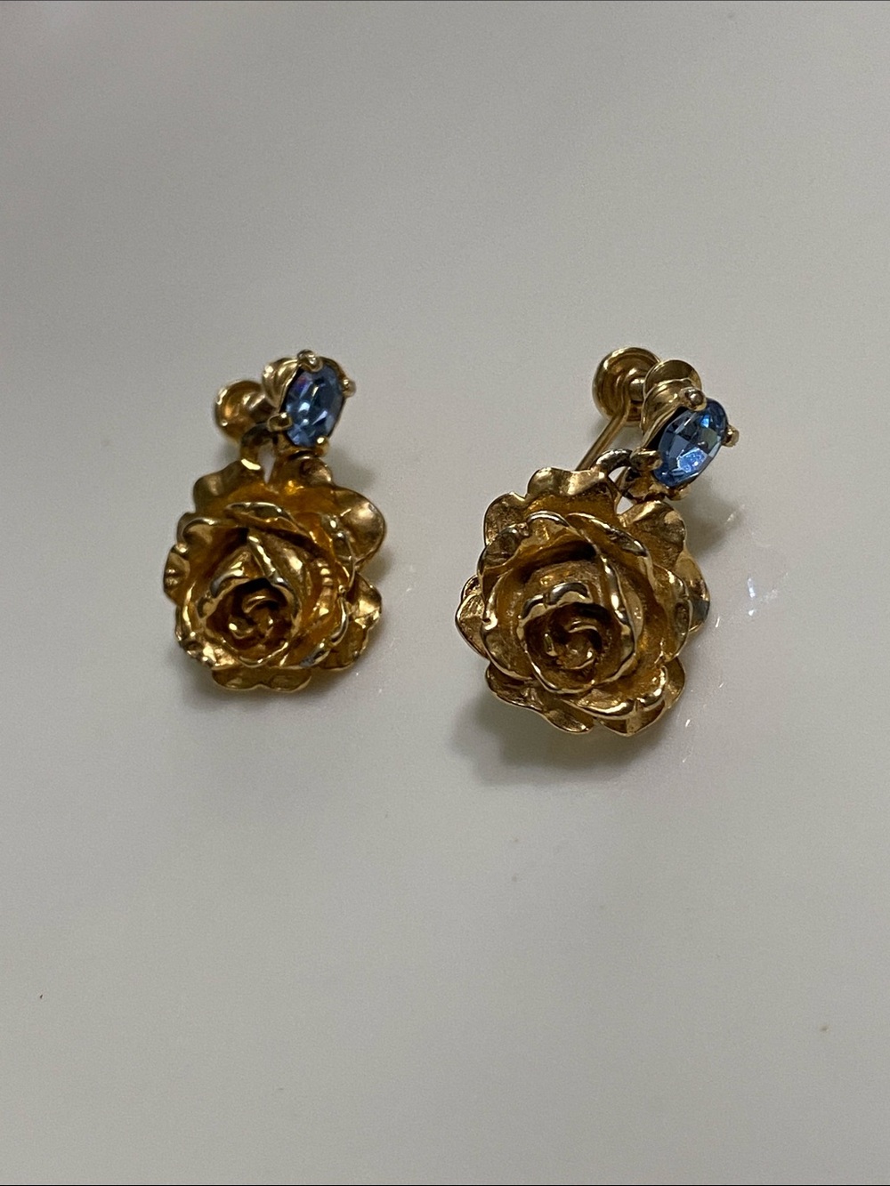 Gold Rose Clip-On Earrings with Blue Crystal Accent